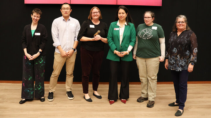Jocelyn Bosley, research impact coordinator, poses with Slam participants (from left) Ran Wang, Shannon Bartelt-Hunt, Jamilla Teixeira and Susan VanderPlas and Wendy Van of Open Window Communications.